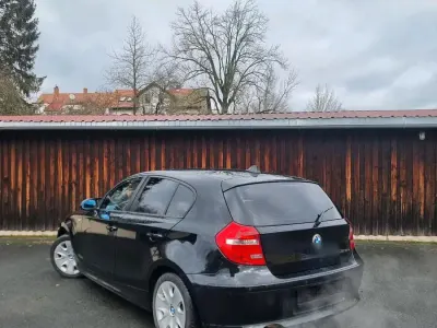 Gebraucht BMW 116 101 PS (74 kW) 2008 Schwarz Kleinwagen