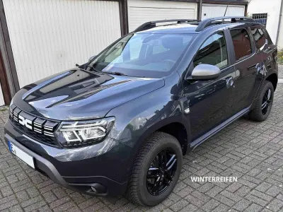 Gebraucht Dacia Duster Journey 116 PS (85 kW) 2024 Grau SUV