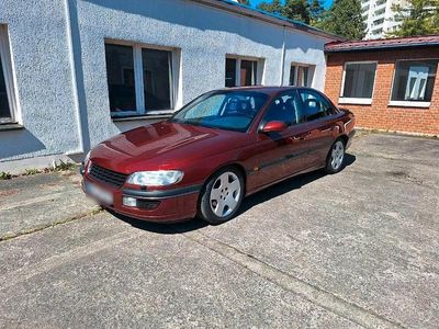 Second-hand Opel Omega 211 CP (155 kW) 1995 Roșu Berlinǎ