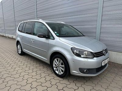 Second-hand VW Touran Style 105 CP (77 kW) 2011 Argintiu Monovolum