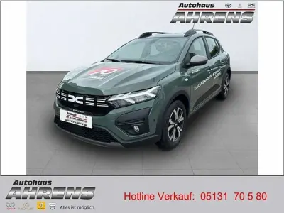 Gebraucht Dacia Sandero Expression 110 PS (80 kW) 2023 Safarigrüngrau metallic Kleinwagen
