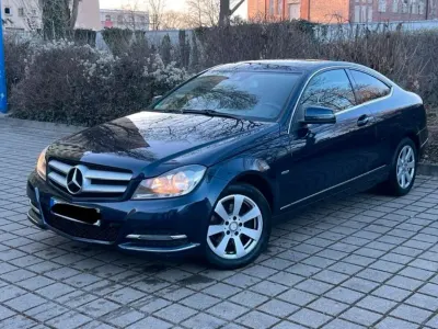 Używany Mercedes C220 Elegance 170 KM (125 kW) 2011 Brązowy Coupe