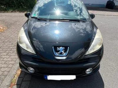 Gebraucht Peugeot 207 73 PS (53 kW) 2009 Schwarz Kleinwagen
