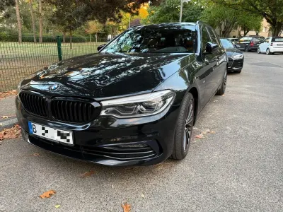 Second-hand BMW 520 Sport Line 190 CP (139 kW) 2017 Negru Break