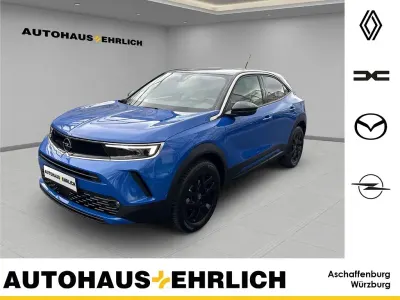 Gebraucht Opel Mokka Business Elegance 131 PS (96 kW) 2023 Perl blau/voltaik blau SUV