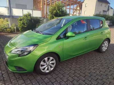 Gebraucht Opel Corsa Edition 90 PS (66 kW) 2015 Grün Kleinwagen