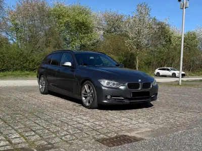 Gebraucht BMW 318 Sport Line 143 PS (105 kW) 2013 Grau Kombi