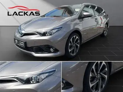 Gebraucht Toyota Auris Hybrid Basis 136 PS (100 kW) 2015 Avantgarde bronze metallic