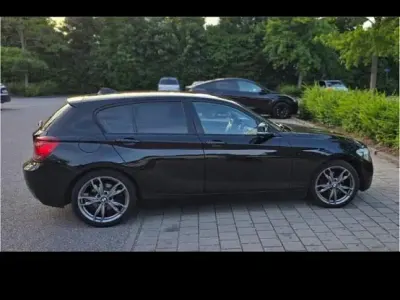 Gebraucht BMW 120 184 PS (135 kW) 2012 Schwarz Kleinwagen