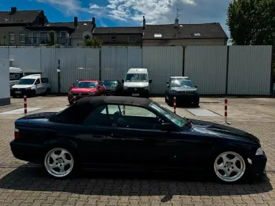 Gebraucht BMW 323 Cabriolet Basis 170 PS (125 kW) 1996 Schwarz Cabrio