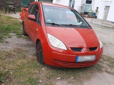 Second-hand Mitsubishi Colt 93 CP (68 kW) 2006 Roșu Hatchback