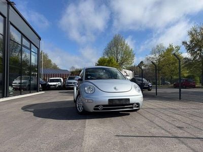 Second-hand VW New Beetle 101 CP (74 kW) 2004 Argintiu Hatchback