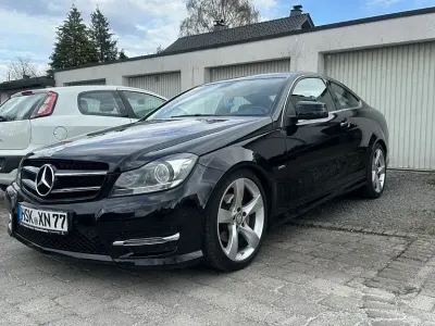 Używany Mercedes C220 170 KM (125 kW) 2015 Czarny Coupe