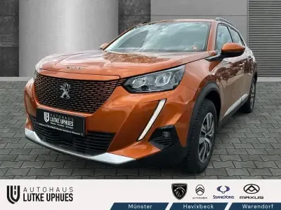 Gebraucht Peugeot e-2008 Allure 100 kW (136 PS) 2021 Orange SUV