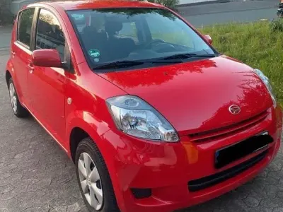 Gebraucht Daihatsu Sirion 68 PS (50 kW) 2010 Rot Kleinwagen
