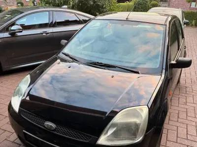 Gebraucht Ford Fiesta 69 PS (50 kW) 2004 Schwarz Kleinwagen