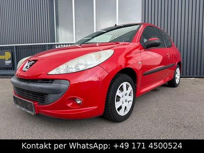 Gebraucht Peugeot 206 Basis 73 PS (53 kW) 2012 Rot Kleinwagen