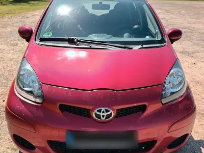 Second-hand Toyota Aygo 68 CP (50 kW) 2010 Roșu Hatchback
