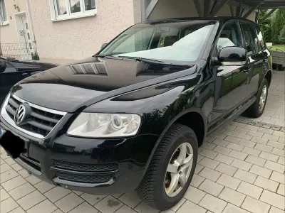 Second-hand VW Touareg R 174 CP (127 kW) 2006 Negru SUV