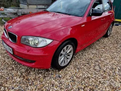 Używany BMW 116 Advantage 122 KM (89 kW) 2011 Czerwony Hatchback
