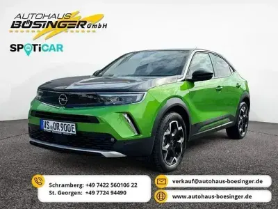 Gebraucht Opel Mokka-e Ultimate 100 kW (136 PS) 2023 Matcha green/ikone gruen SUV