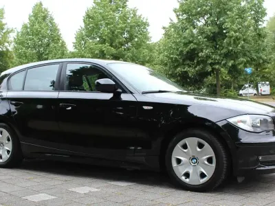 Gebraucht BMW 116 122 PS (89 kW) 2010 Schwarz ii Kleinwagen