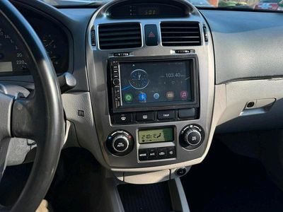 Second-hand Kia Cerato 113 CP (83 kW) 2006 Argintiu Berlinǎ