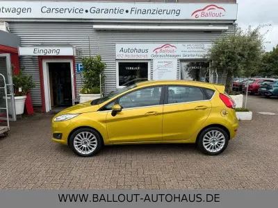 Gebraucht Ford Fiesta Titanium 80 PS (58 kW) 2013 Gelb Limousine
