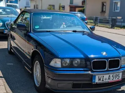 Gebraucht BMW 318 Cabriolet 116 PS (85 kW) 1995 Blau Cabrio