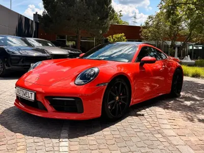 Gebraucht Porsche 911 Carrera 4S Chrono 450 PS (330 kW) 2021 Orange Coupé