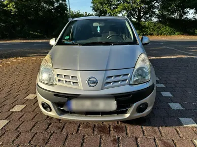 Gebraucht Nissan Pixo 68 PS (50 kW) 2009 Silber Kleinwagen
