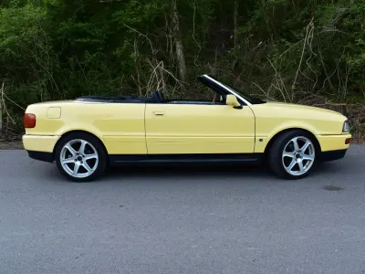 Gebraucht Audi Cabriolet 133 PS (97 kW) 1992 Gelb Cabrio