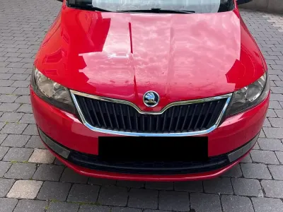 Używany Skoda Rapid Ambition 105 KM (77 kW) 2014 Czerwony Hatchback