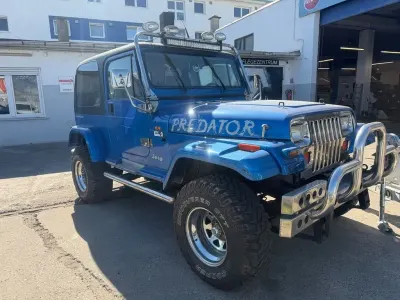 Second-hand Jeep Wrangler 121 CP (88 kW) 1992 Albastru SUV