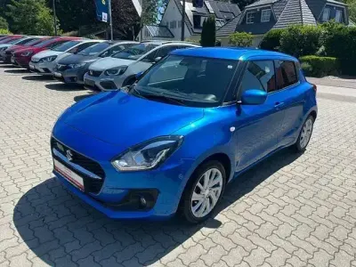Gebraucht Suzuki Swift Comfort 83 PS (61 kW) 2023 Speedy blue met. (metallic) Kleinwagen