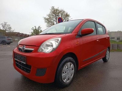 Gebraucht Daihatsu Cuore 58 PS (42 kW) 2011 Rot Kleinwagen