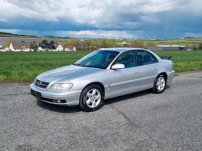 Second-hand Opel Omega 144 CP (105 kW) 2003 Argintiu Berlinǎ