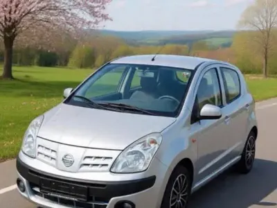 Gebraucht Nissan Pixo 68 PS (50 kW) 2012 Silber Kleinwagen