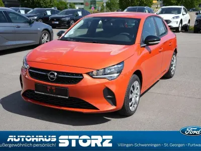 Gebraucht Opel Corsa-e Basis 100 kW (136 PS) 2022 Power orange/dynamik orange Kleinwagen