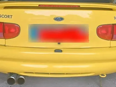 Gebraucht Ford Escort Cabriolet 90 PS (66 kW) 1996 Gelb Cabrio