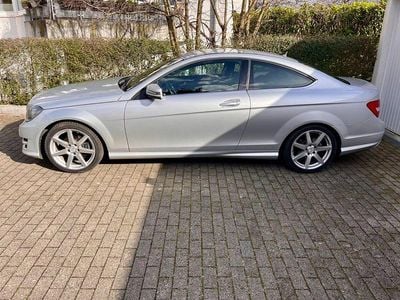 Second-hand Mercedes C180 AMG line 156 CP (114 kW) 2012 Argintiu Coupe