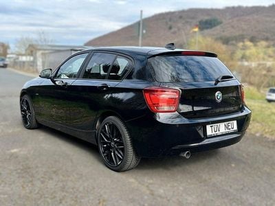 Second-hand BMW 118 Sport Line 170 CP (125 kW) 2012 Negru Hatchback