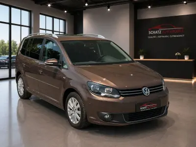 Gebraucht VW Touran Life 140 PS (102 kW) 2013 Braun Van / Kleinbus