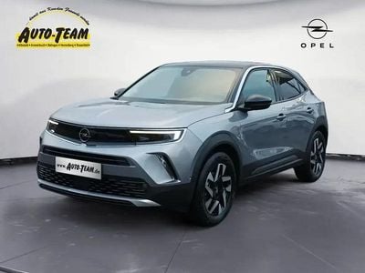 Gebraucht Opel Mokka-e Elegance 100 kW (136 PS) 2023 Kontrast grau metallic SUV