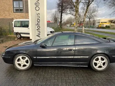 Używany Opel Calibra 116 KM (85 kW) 1992 Czarny Coupe