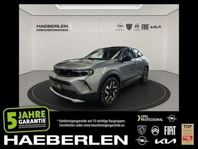 Gebraucht Opel Mokka Elegance 131 PS (96 kW) 2022 Kontrast grau/quarz silber SUV