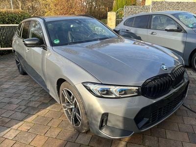 Skyscraper grau met Gebraucht 2022 BMW 320 M Sport Kombi | 23.999 € (Fairer Preis)