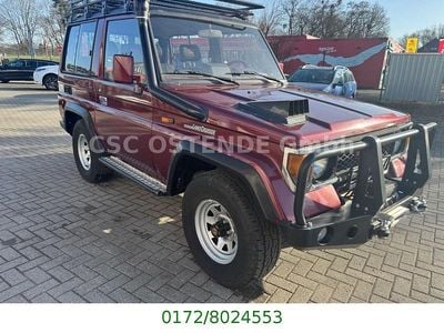Second-hand Toyota Land Cruiser 86 CP (63 kW) 1990 Roșu SUV