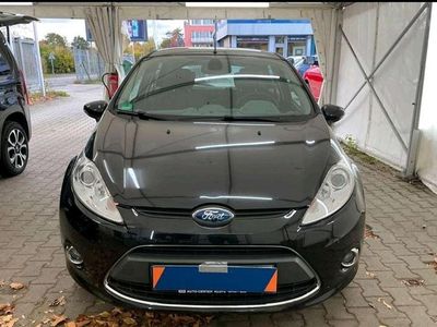 Gebraucht Ford Fiesta Ghia 101 PS (74 kW) 2009 Pantherschwarz metallic Kleinwagen