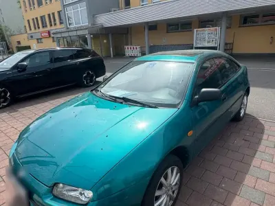 Gebraucht Mazda 323F 88 PS (64 kW) 1995 Grün Limousine